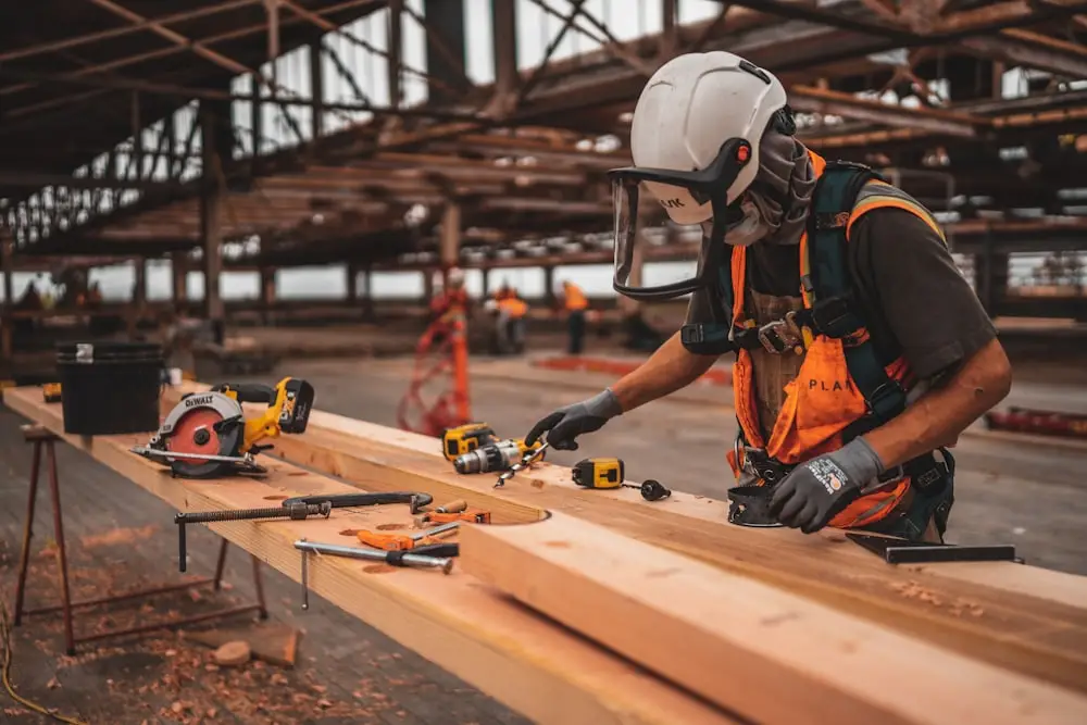 A tradesperson at work with Selby tools and materials